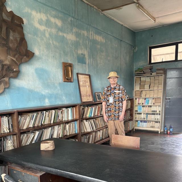 Robinson stands in the office of the late novelist Chinua Achebe at the University of Nigeria, Nsukka.